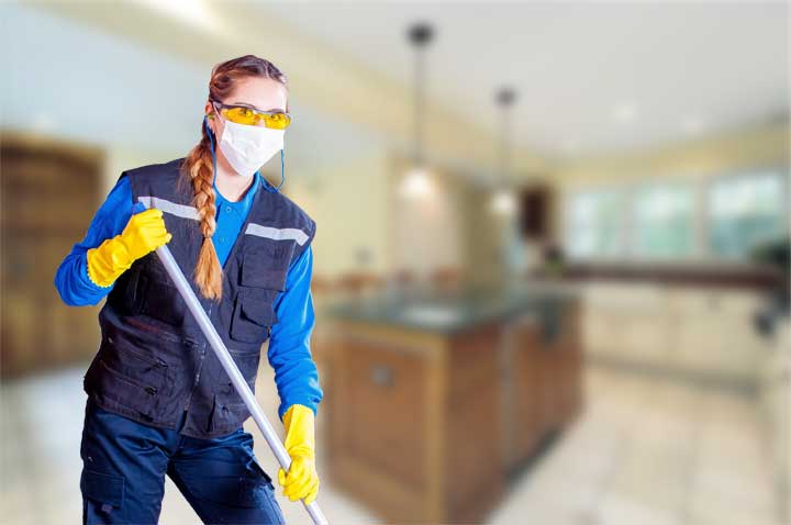 Woman wearing protective gear for cleaning